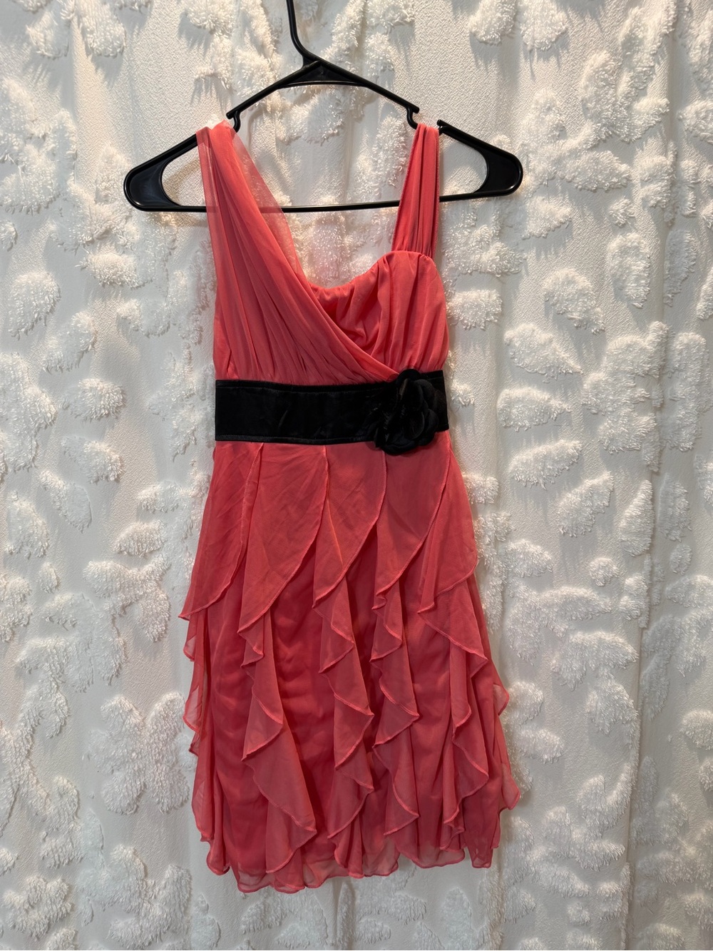 My Michelle coral ruffle dress with black belt